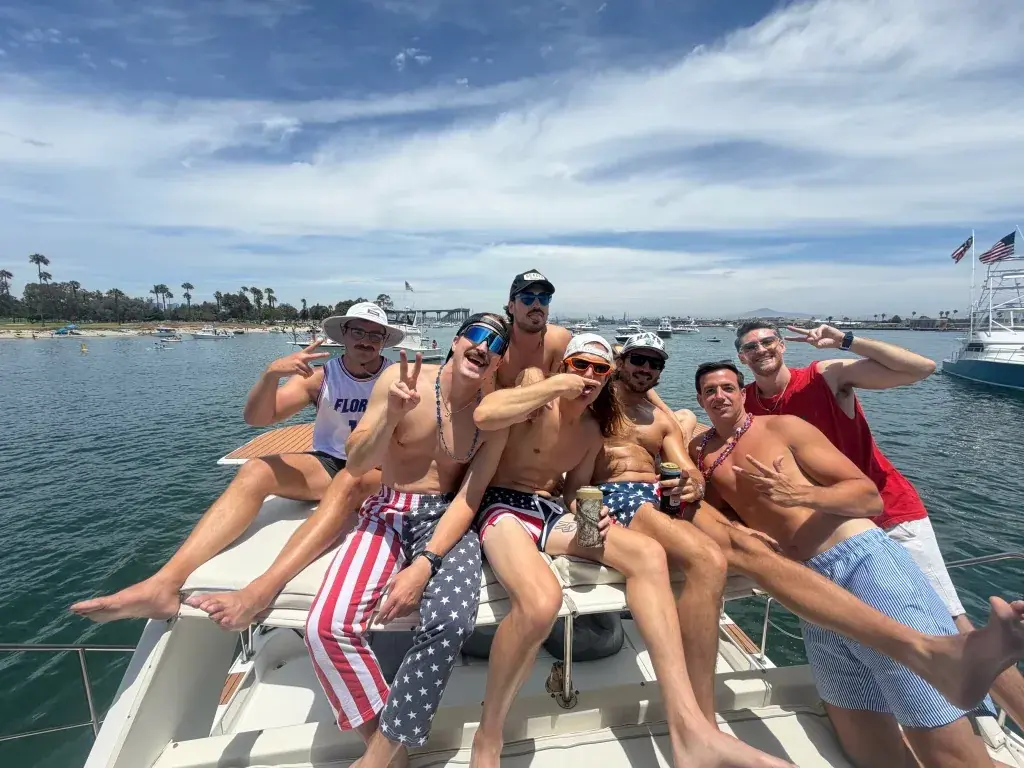 Friends celebrating the Fourth of July on a boat